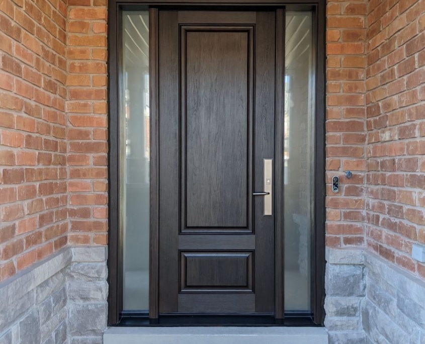 Elegant fiberglass woodgrain door with multipoint lock installed in Aurora
